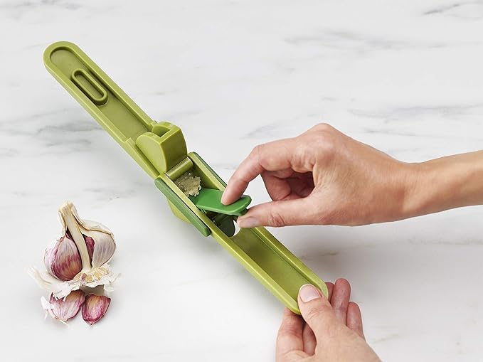 Joseph Joseph CleanForce Garlic Press with Wiper Green