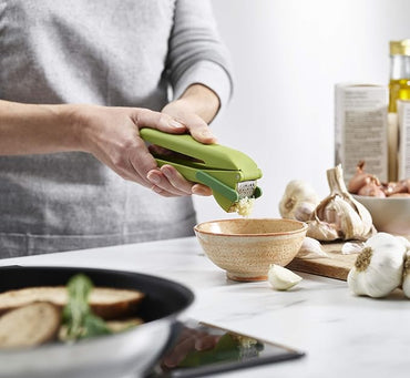 Joseph Joseph CleanForce Garlic Press with Wiper Green