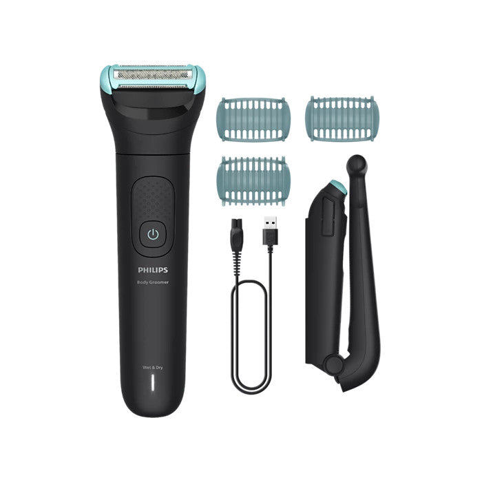 Philips body grooming kit with shaver, attachments, and charging cable on a white background